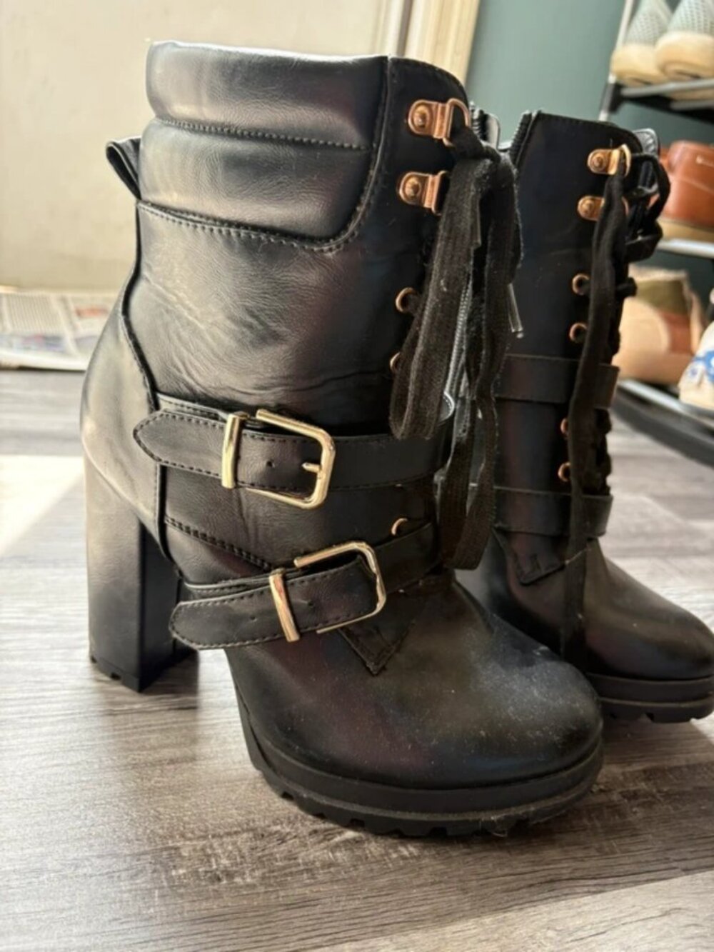 High heel boots with straps